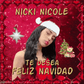 nicki nicole is wearing a santa hat and smoking a cigarette .