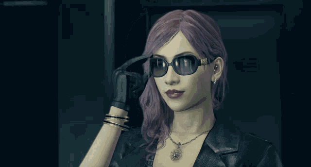 a woman with purple hair and red lips is wearing a black leather jacket