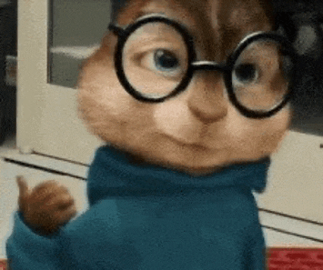 alvin the chipmunk wearing glasses and a blue sweater is giving a thumbs up .