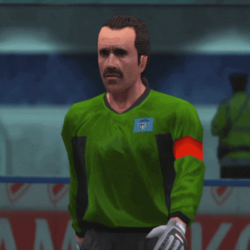 a man with a mustache wearing a green jersey with a patch that says fcb on it