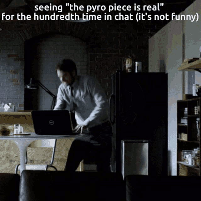 a man sits at a desk with a dell laptop and says " seeing the pyro piece is real "