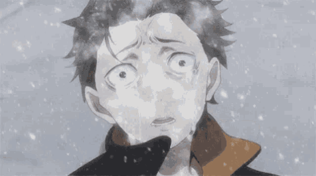 a close up of a person 's face with snow falling around him