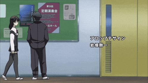 a man and a woman are standing in front of a sign that says ' 定期 演奏 会 第 9 回 '