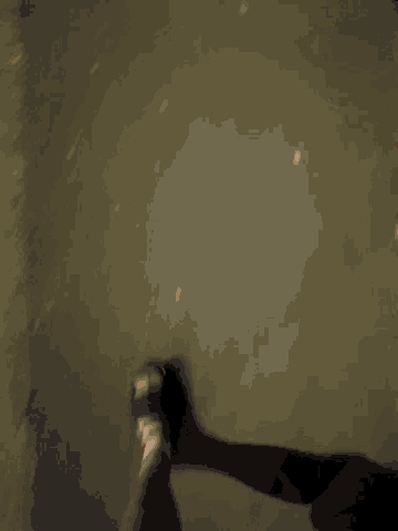 a blurry picture of a person 's feet and shoes