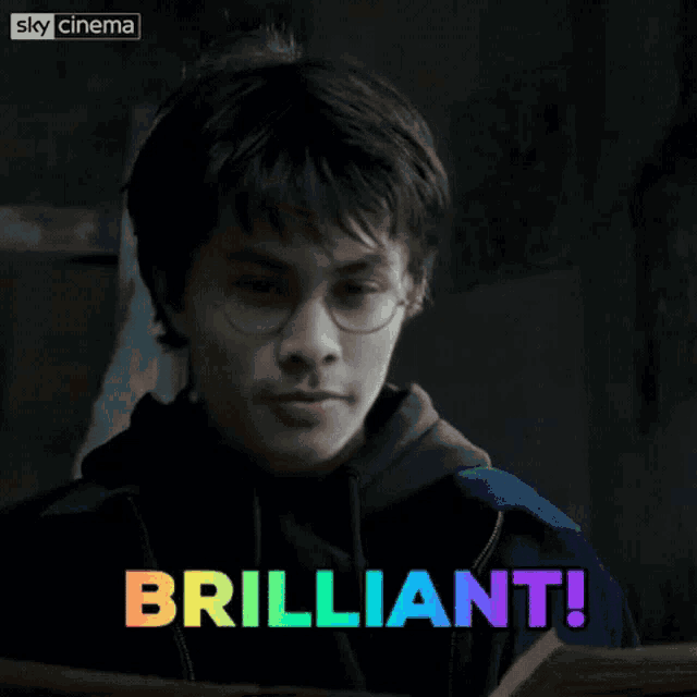 a boy with glasses and the word brilliant on the bottom right
