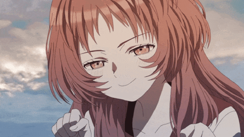 a close up of a girl with long red hair