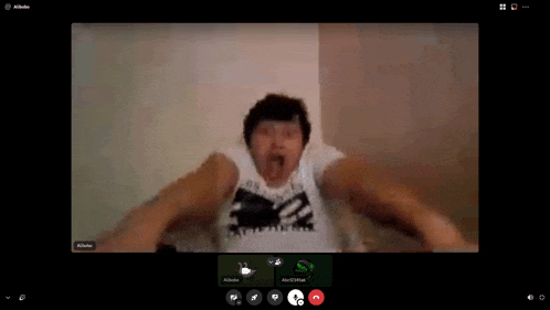 a man is making a funny face during a video call