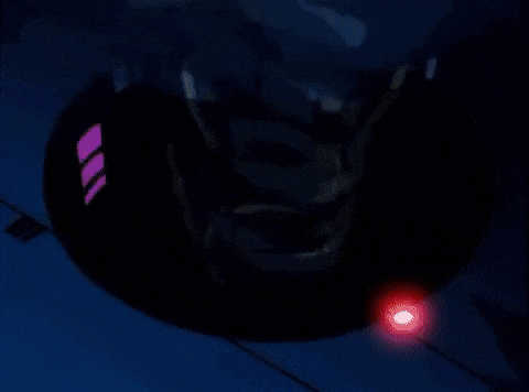 a close up of a shadow the hedgehog 's face with red eyes