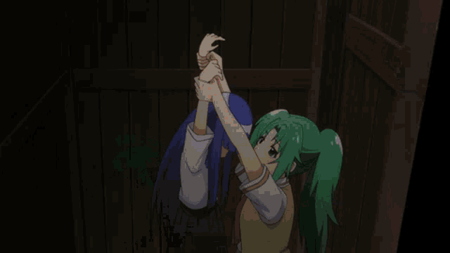 a girl with green hair and a red tie looks down