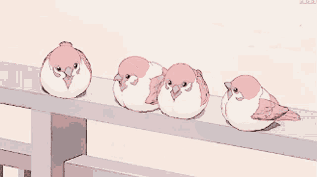 two birds are standing on a railing and one has a pink feather in its beak
