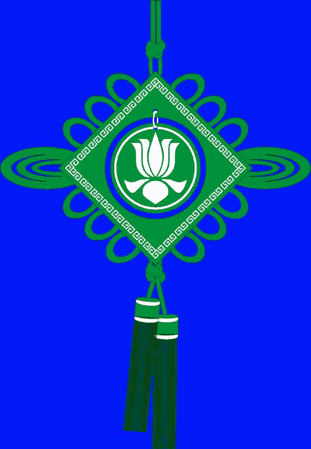 a green decoration with a white lotus flower in the center