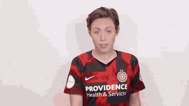 a person wearing a providence health & services jersey