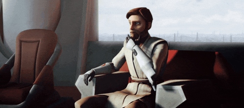 a man with a beard is sitting in a chair and looking out a window