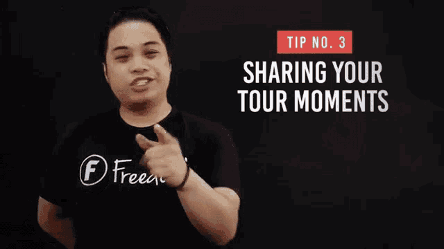 a man wearing a black shirt that says freedom talks about sharing your tour moments