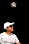 a man wearing sunglasses and a white hat is standing in front of a black background that says thank you prasad