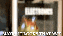 a blurred image of a squirrel with the words maybe it looks that way