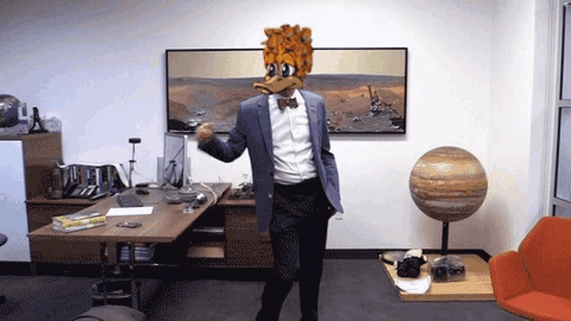 a man wearing a duck mask is dancing in front of a picture of mars