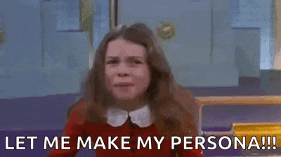 a girl in a red dress is making a funny face and saying `` let me make my persona '' .