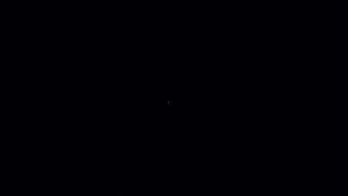 a white circle in the middle of a yellow and orange background .