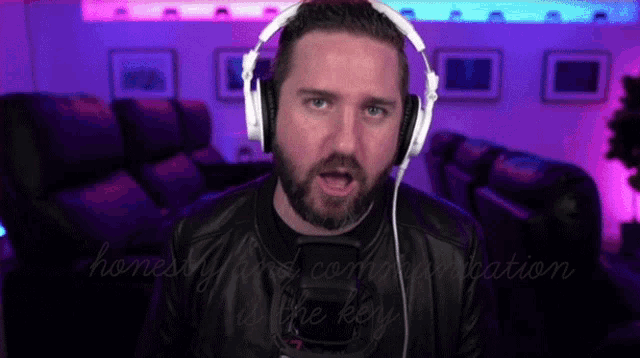 a man wearing headphones with the words honestly good communication written on the bottom
