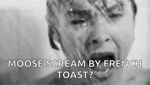 a black and white photo of a woman screaming in a shower .