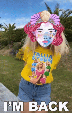 a woman wearing a yellow t-shirt that says italia storm on it