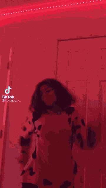 a colorful drawing of a person with a tiktok sticker