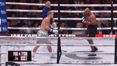 a boxing match between jake paul and tyson with the score 36 8