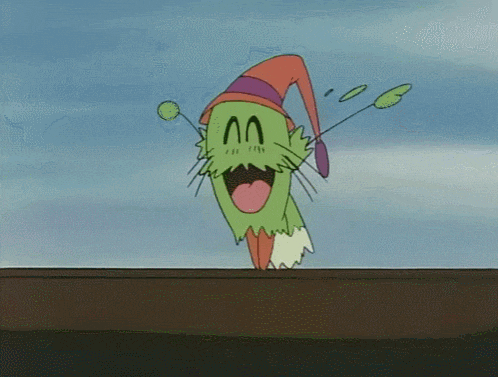 a green cartoon character wearing a witch hat is flying through the air