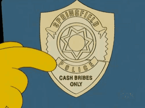 a springfield police badge that says cash bribes only on it