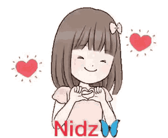 a little girl is making a heart shape with her hands and smiling .