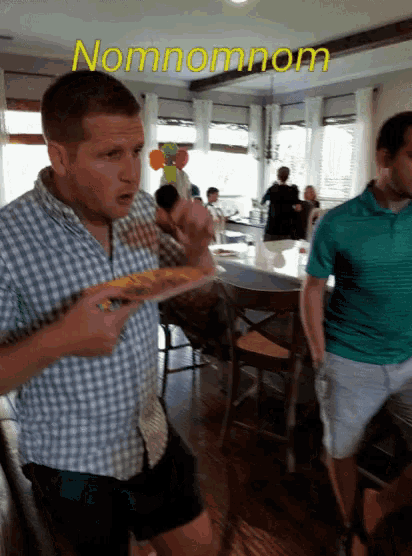 a man in a plaid shirt is holding a plate of food with the word nomnomnom written above him