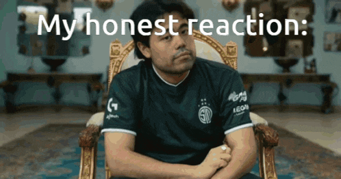 a man sitting in a chair with the words " my honest reaction " written above him