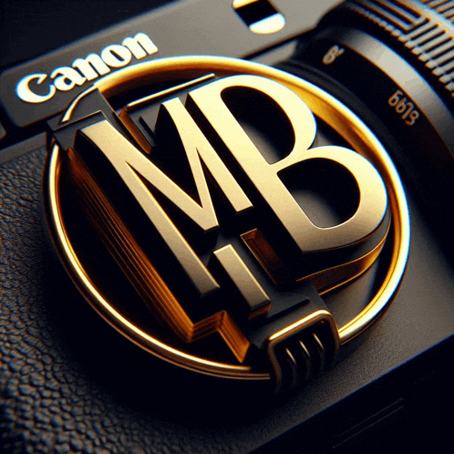 a close up of a canon camera with a gold mb logo