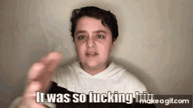 a young man is making a funny face and saying it was so fucking him