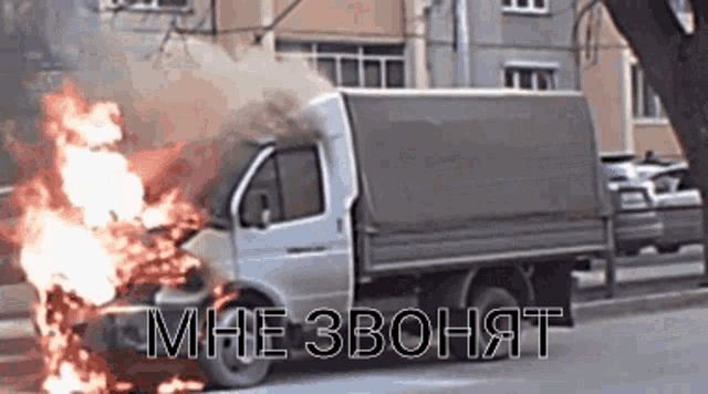 a white truck is on fire with the words " mne 3bohyat " written on the bottom