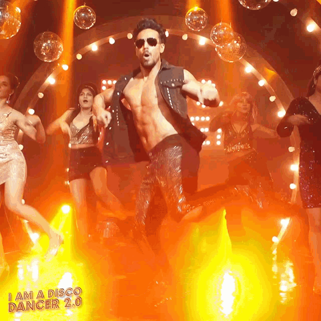 a poster for i am a disco dancer 2.0 shows a man dancing on stage