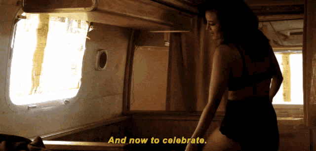 a woman in lingerie says " and now to celebrate " in yellow letters