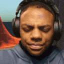 a man wearing headphones is making a face .