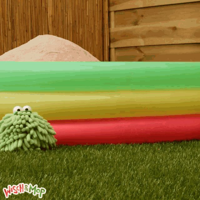 a rainbow colored pool with the words wish & mop in the corner