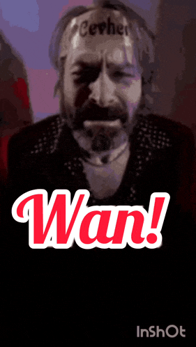 a man with a beard is wearing a headband that says cevher on it