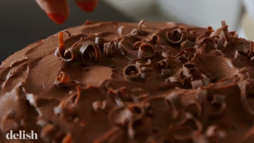 Chocolate Topping Chocolate Shavings GIF - Chocolate Topping Chocolate Shavings Chocolate Cake GIFs