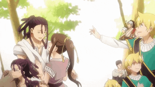 a group of anime characters are posing for a picture in a forest .