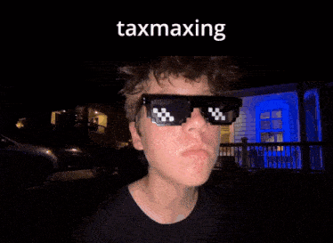 a man wearing sunglasses with the word taxmaxing on the bottom right