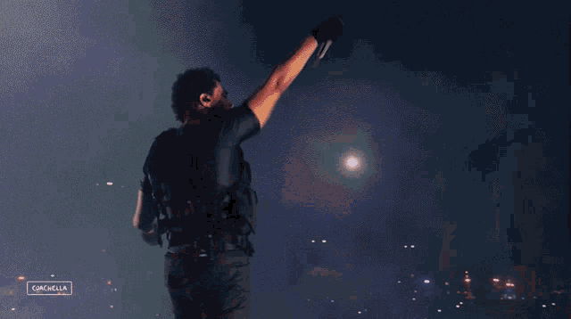 a man with his arms outstretched is standing in front of a sign that says cancela