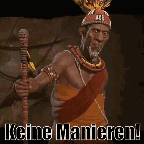 a man with a beard is holding a cane in front of a sign that says keine manieren