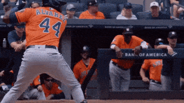 a baseball player with the number 44 on the back of his shirt