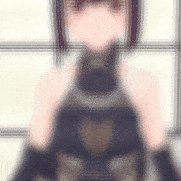 a blurry picture of a girl wearing gloves and a black top