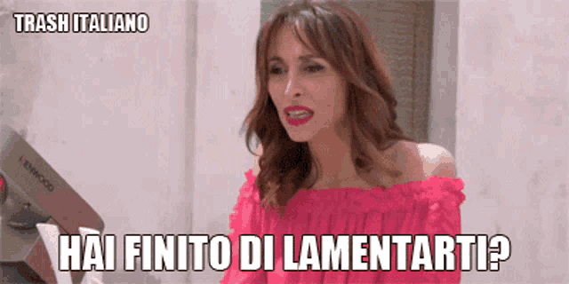 a woman in a pink top says hai finito di lamentarti ?
