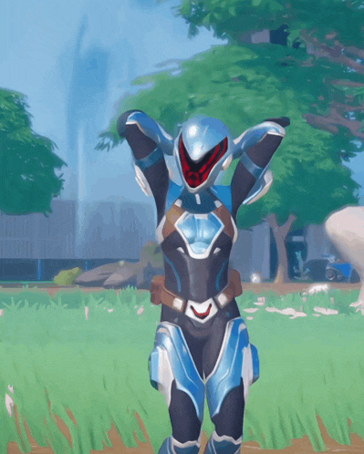 a video game character is standing in a field with his hands in the air